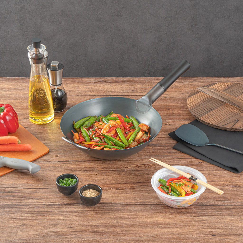 Motomori 12" Black Carbon Steel Flat Bottom Wok / Stir Fry Pan - Pre-seasoned, with Wooden Handle - 1 count box