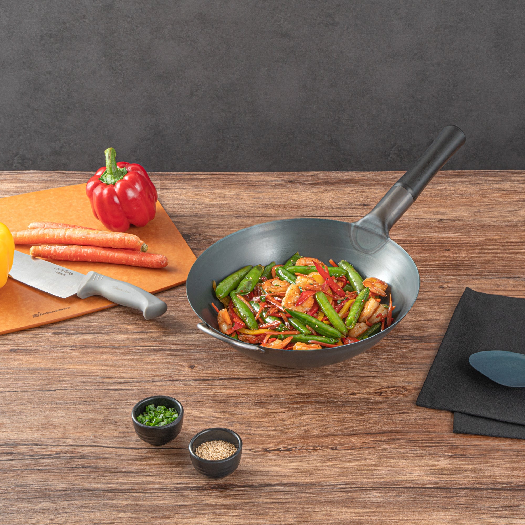 Motomori 12" Black Carbon Steel Flat Bottom Wok / Stir Fry Pan - Pre-seasoned, with Wooden Handle - 1 count box