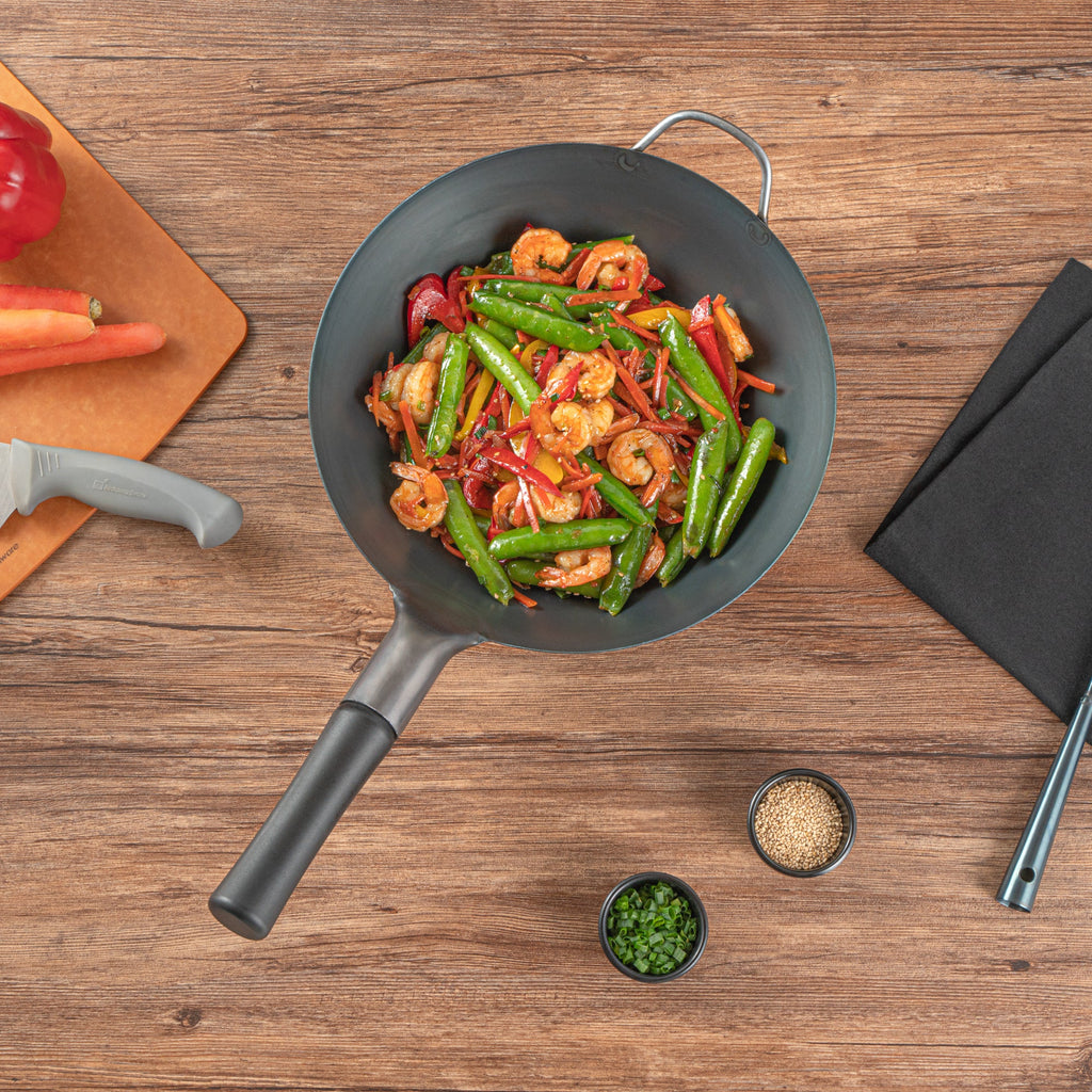 Motomori 12" Black Carbon Steel Flat Bottom Wok / Stir Fry Pan - Pre-seasoned, with Wooden Handle - 1 count box