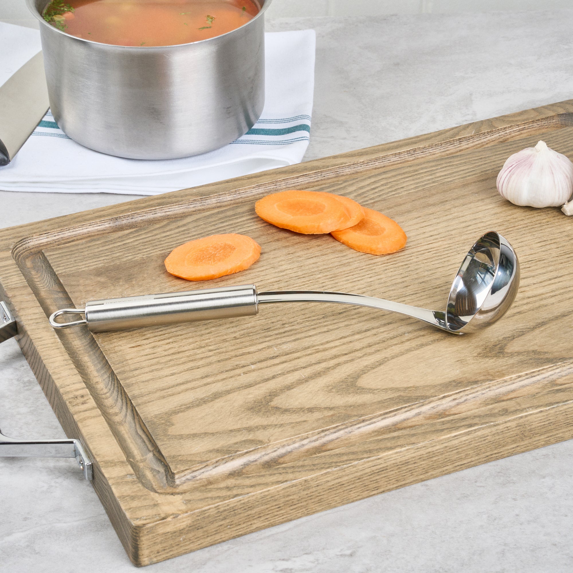 German Standard Stainless Steel Sauce Ladle - One-Piece - 10 3/4'' - 1 count box