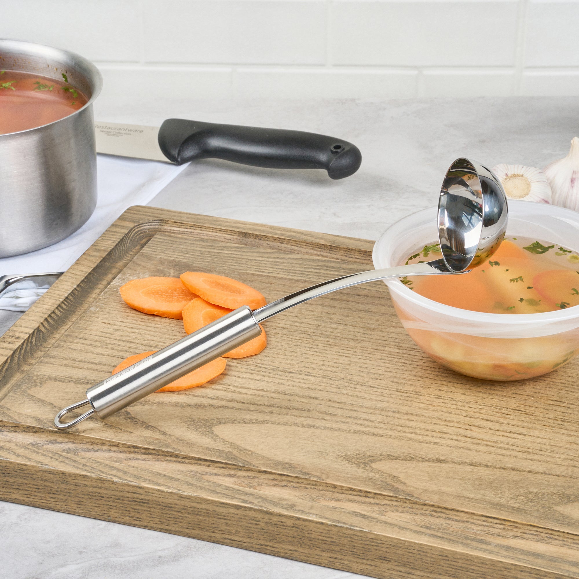German Standard Stainless Steel Sauce Ladle - One-Piece - 10 3/4'' - 1 count box