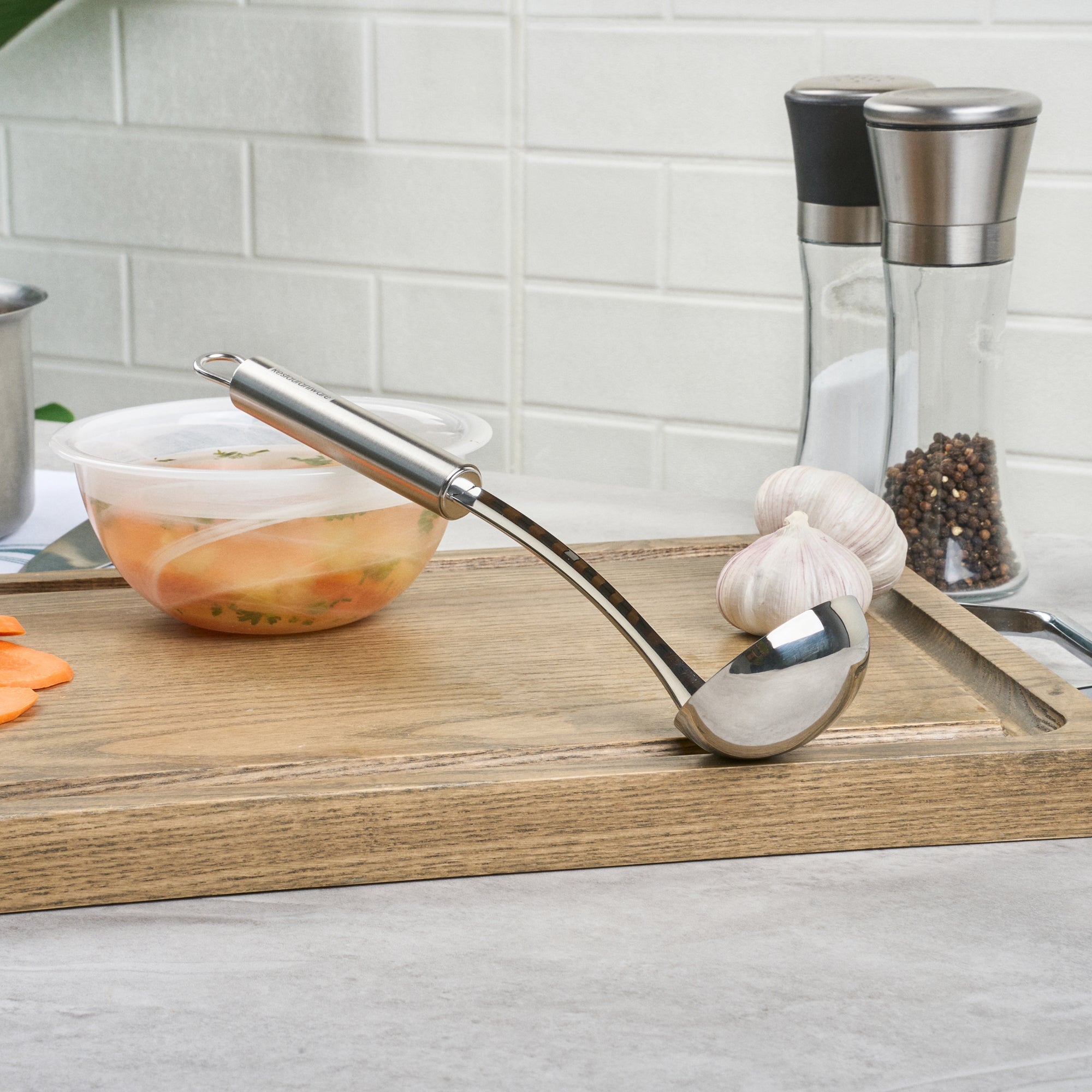 German Standard Stainless Steel Sauce Ladle - One-Piece - 10 3/4'' - 1 count box