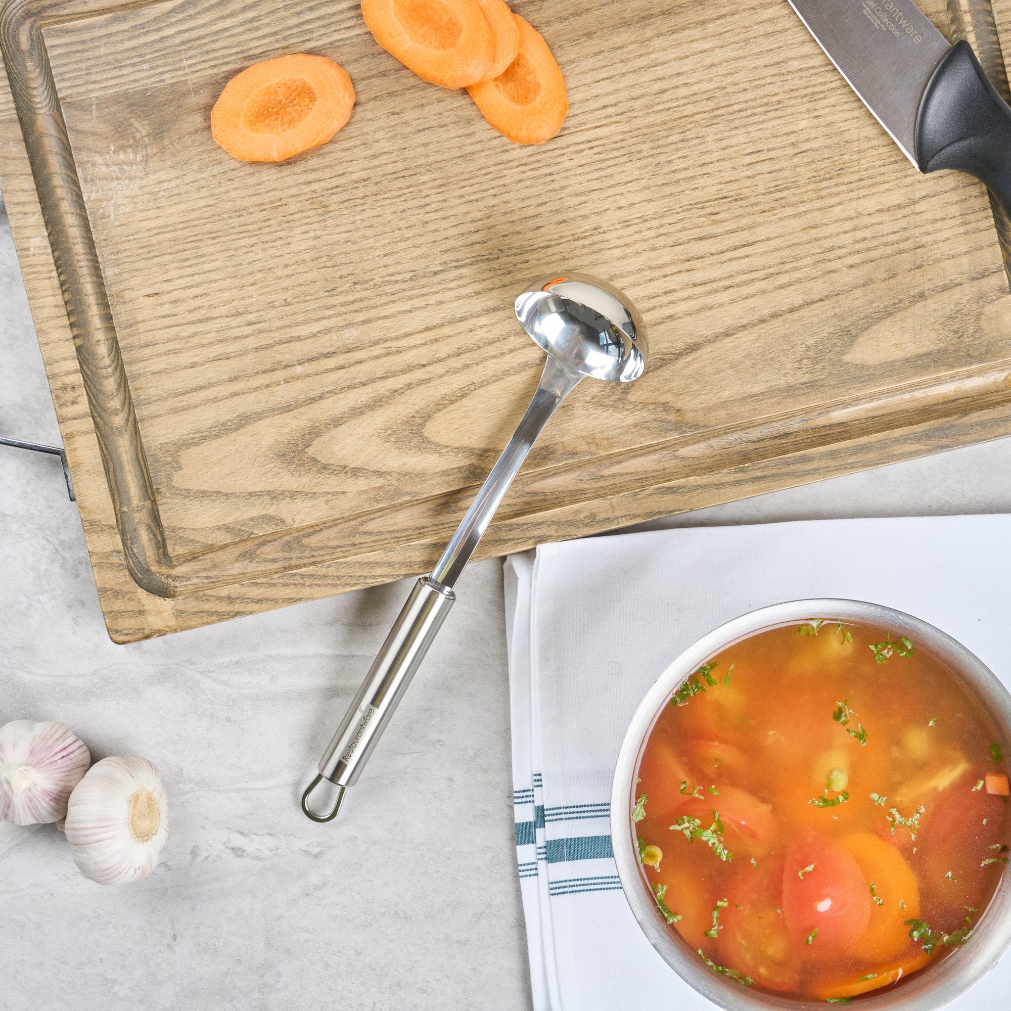 German Standard Stainless Steel Sauce Ladle - One-Piece - 10 3/4'' - 1 count box
