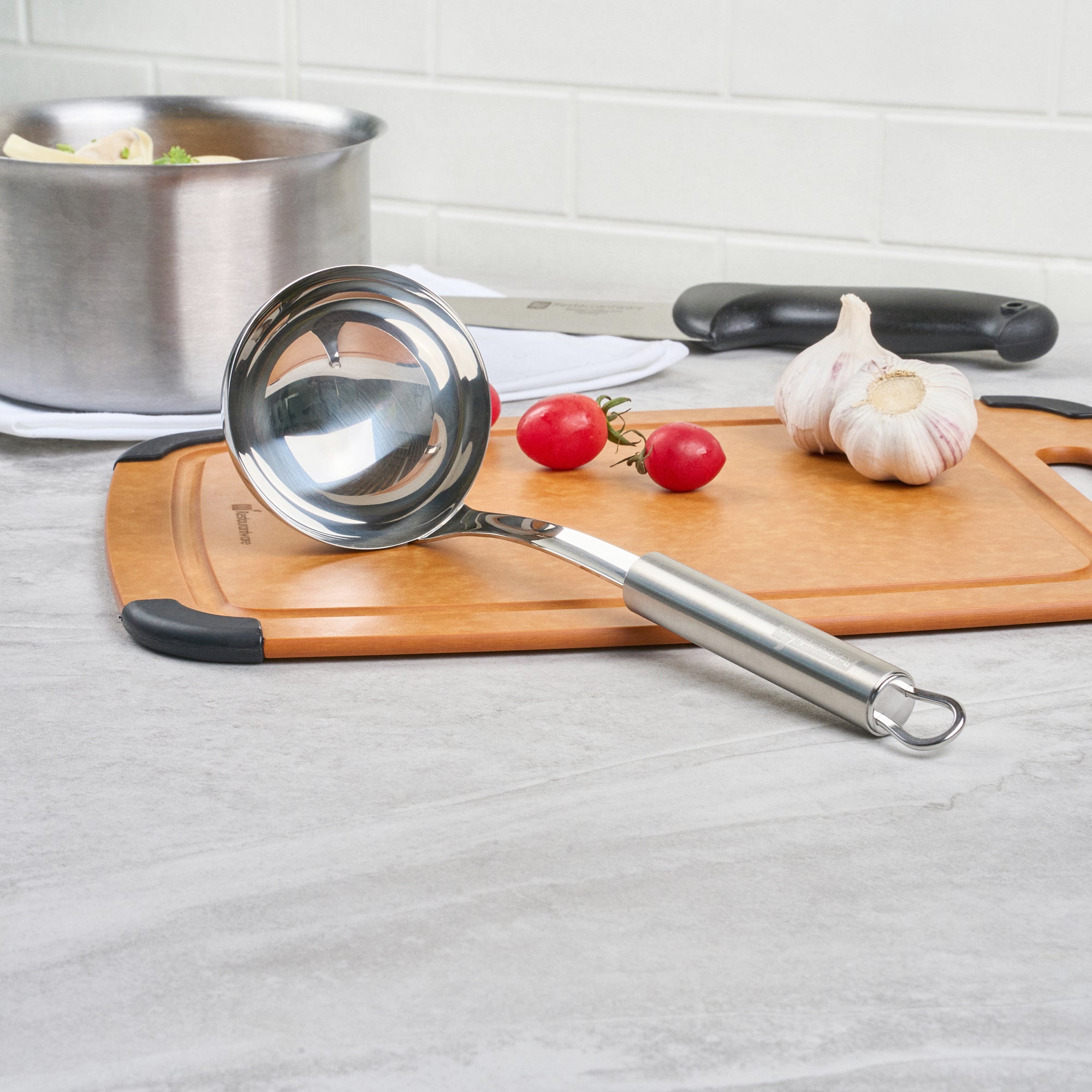 German Standard Stainless Steel Serving Ladle - One-Piece - 11 1/2'' - 1 count box