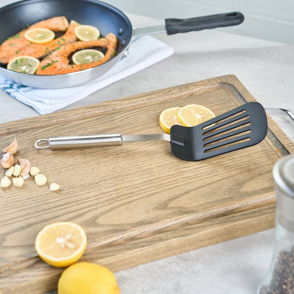 German Standard Black Nylon High Heat Slotted Turner / Spatula - with Stainless Steel Handle - 12 1/2'' - 1 count box