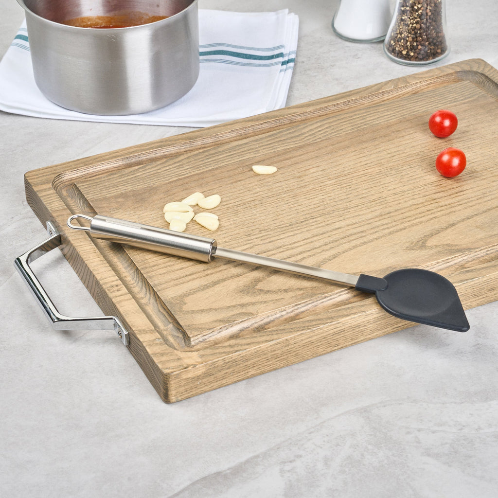 German Standard Black Nylon High Heat Cooking Spoon - Pointed Tip, with Stainless Steel Handle - 12 3/4'' x 2 1/4'' - 1 count box