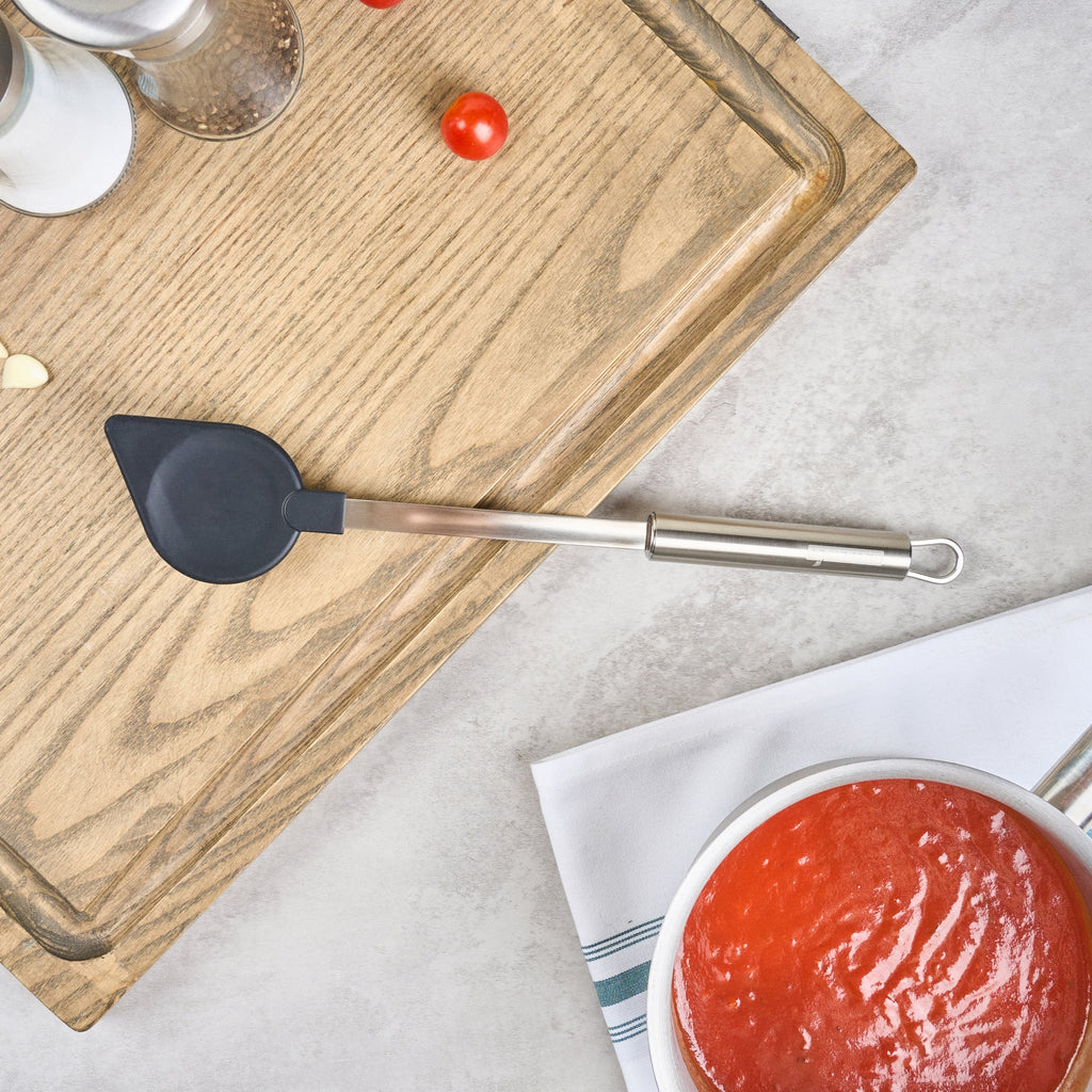German Standard Black Nylon High Heat Cooking Spoon - Pointed Tip, with Stainless Steel Handle - 12 3/4'' x 2 1/4'' - 1 count box