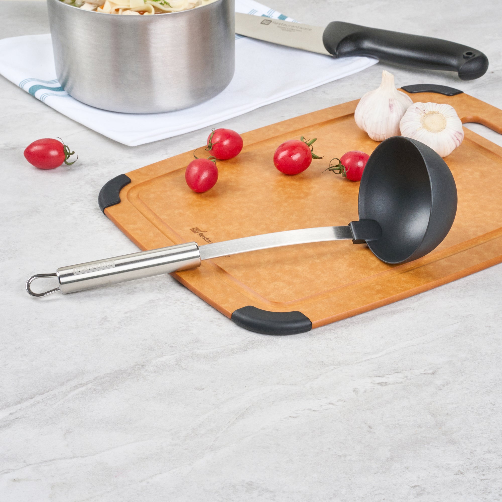 German Standard Black Nylon High Heat Serving Ladle - One-Piece, with Stainless Steel Handle - 12 1/4'' x 3 1/2'' x 3 1/4'' - 1 count box