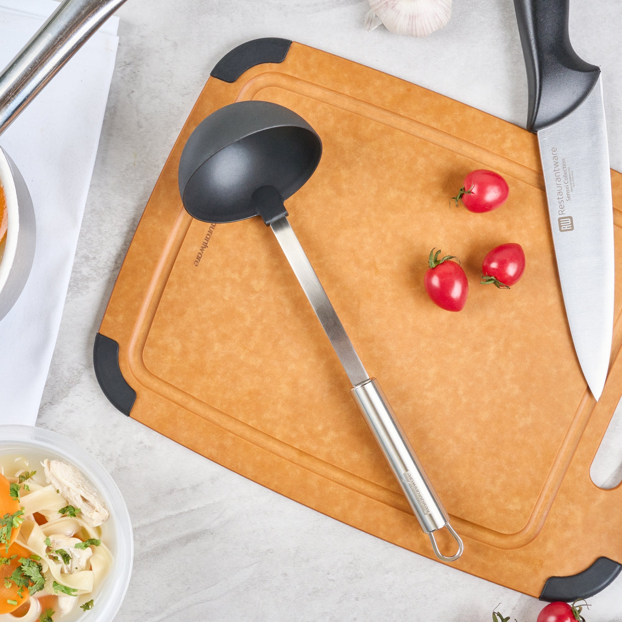 German Standard Black Nylon High Heat Serving Ladle - One-Piece, with Stainless Steel Handle - 12 1/4'' x 3 1/2'' x 3 1/4'' - 1 count box