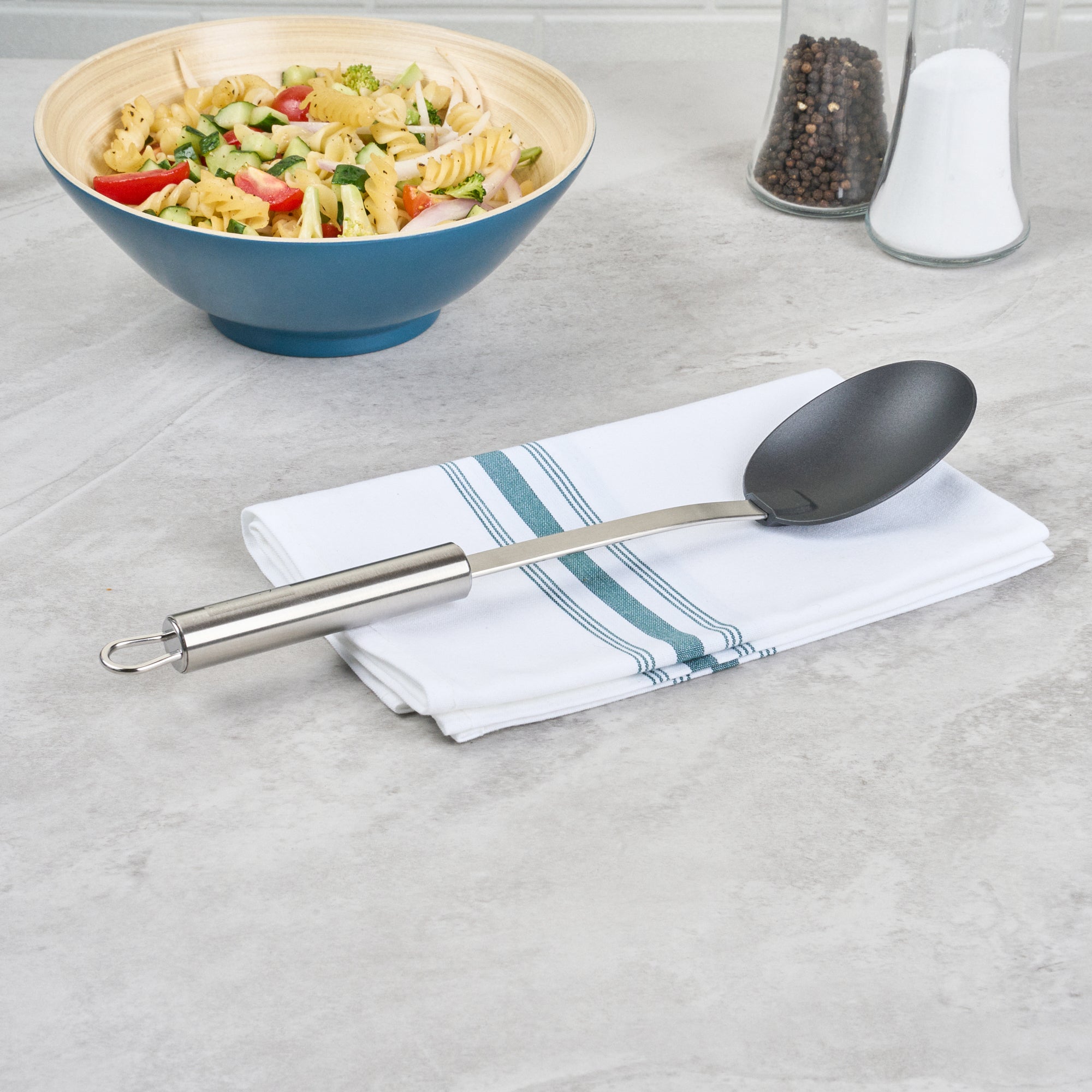 German Standard Black Nylon High Heat Solid Serving Spoon - with Stainless Steel Handle - 12 1/2'' x 2 1/2'' x 1 1/2'' - 1 count box