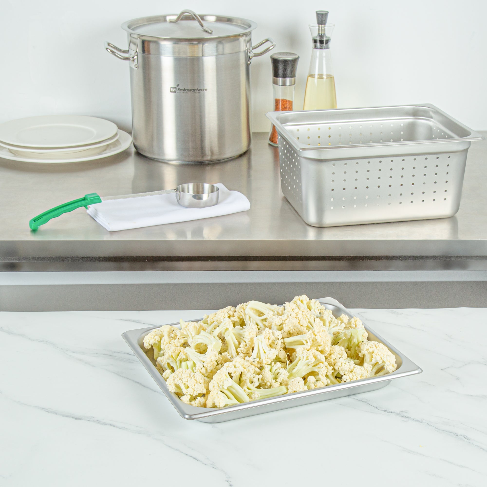 Kitchen Tek Stainless Steel 1/2 Size Steam Table Pan - 1 1/4 Inch Deep, Perforated, Anti Jam, 24 Gauge - 12 count box