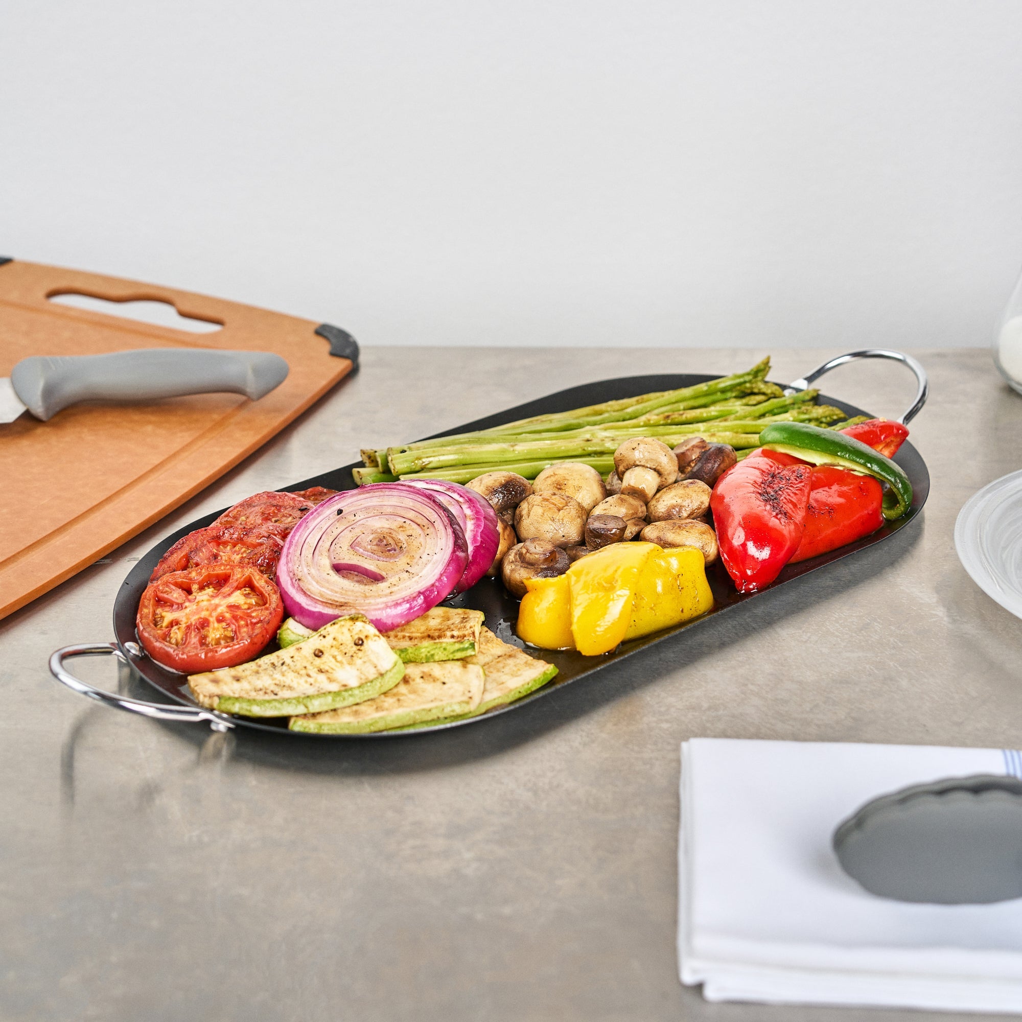 Met Lux Oval Black Carbon Steel Double Burner Griddle - Non-Stick, With Chrome Handles - 17" x 8 3/4" - 10 count box