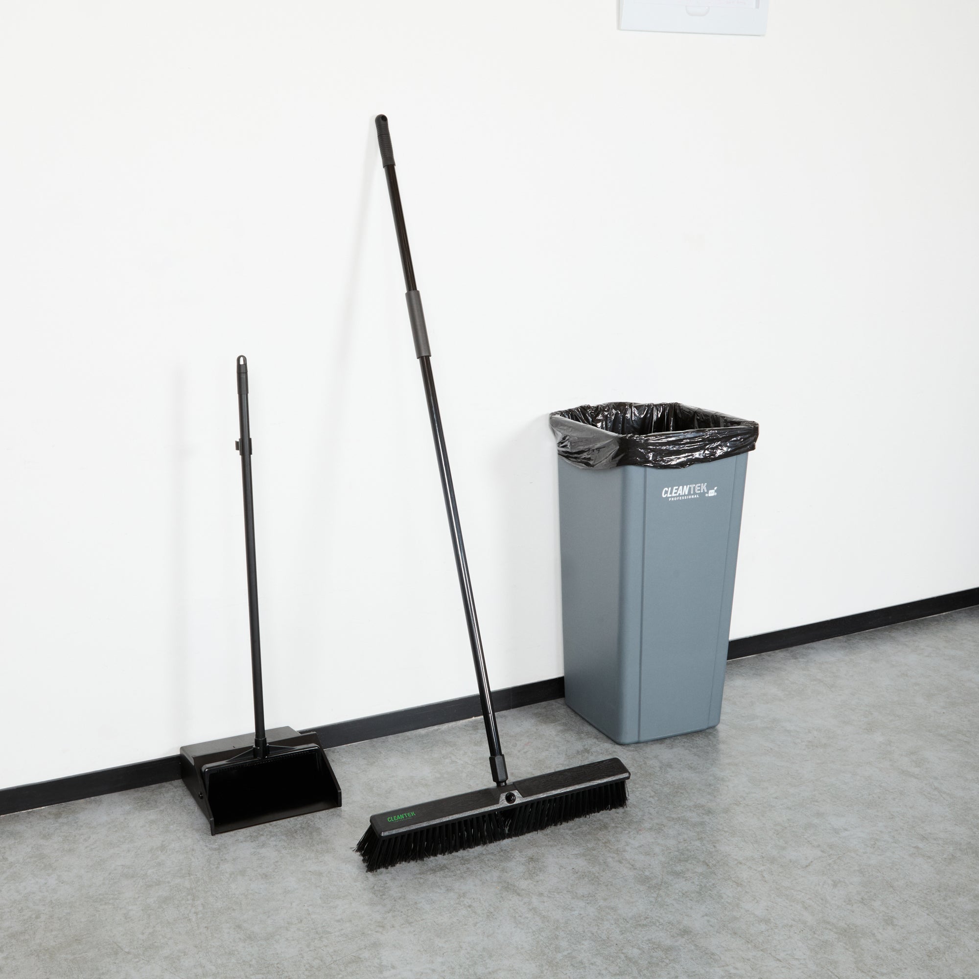 Clean Tek Professional 23 1/2" Black Plastic Push Broom - with Heavy Unflagged Bristles, 59" Steel Handle - 1 count box