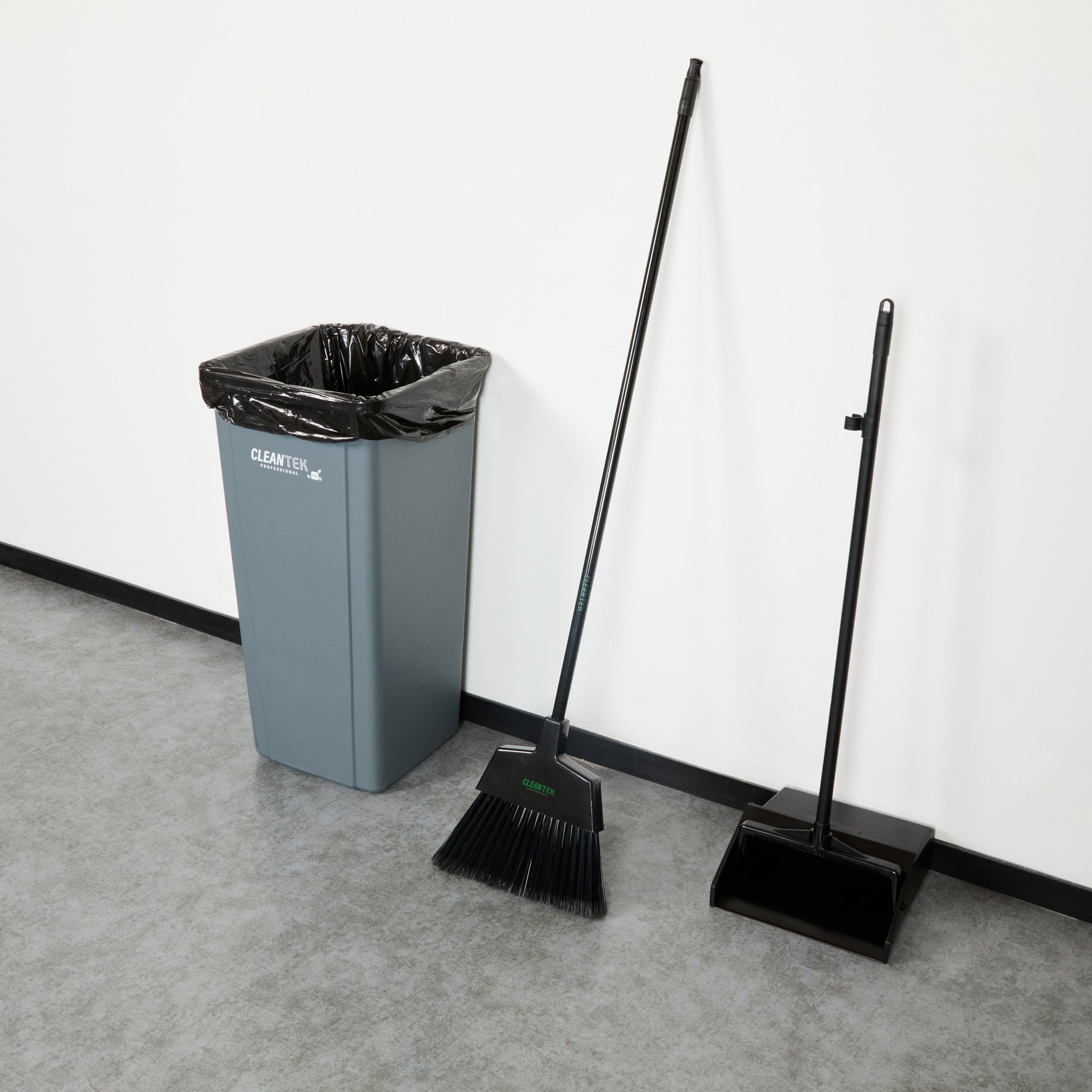 Clean Tek Professional 11 3/4" Black Plastic Angled Broom - with Flagged Bristles, 48" Steel Handle - 1 count box
