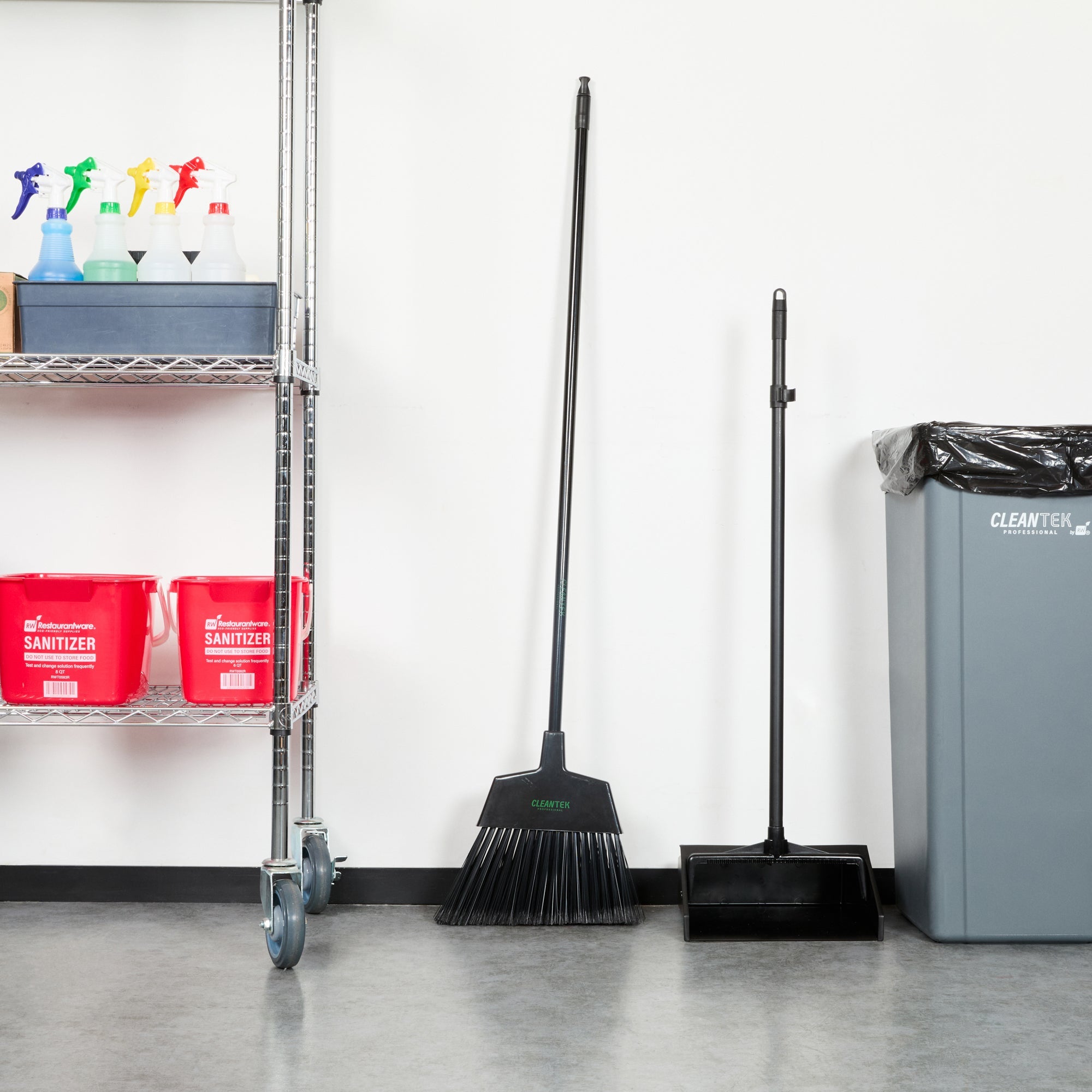 Clean Tek Professional 11 3/4" Black Plastic Angled Broom - with Flagged Bristles, 48" Steel Handle - 1 count box