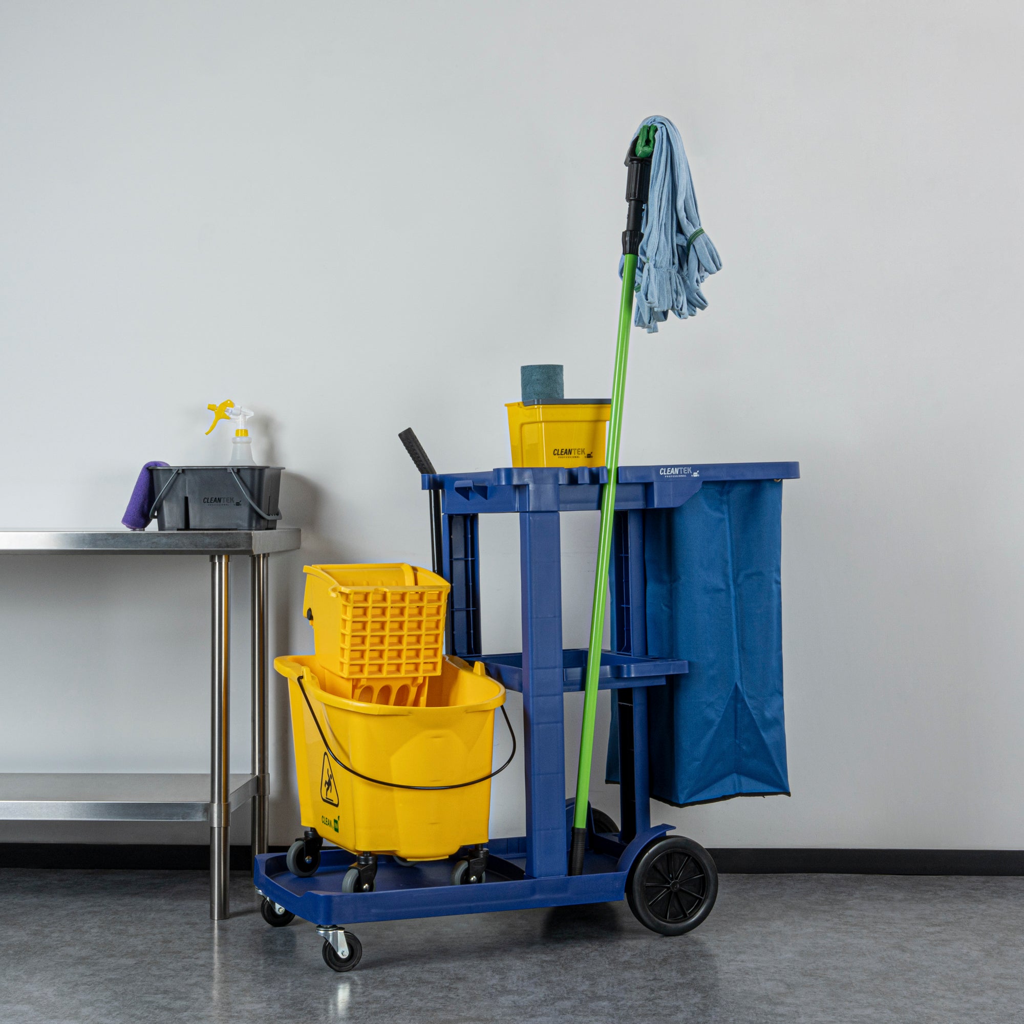 Clean Tek Professional Blue 3-Shelf Janitor Cart - 18 gal Bag - 44" x 18 1/2" x 37 3/4" - 1 count box