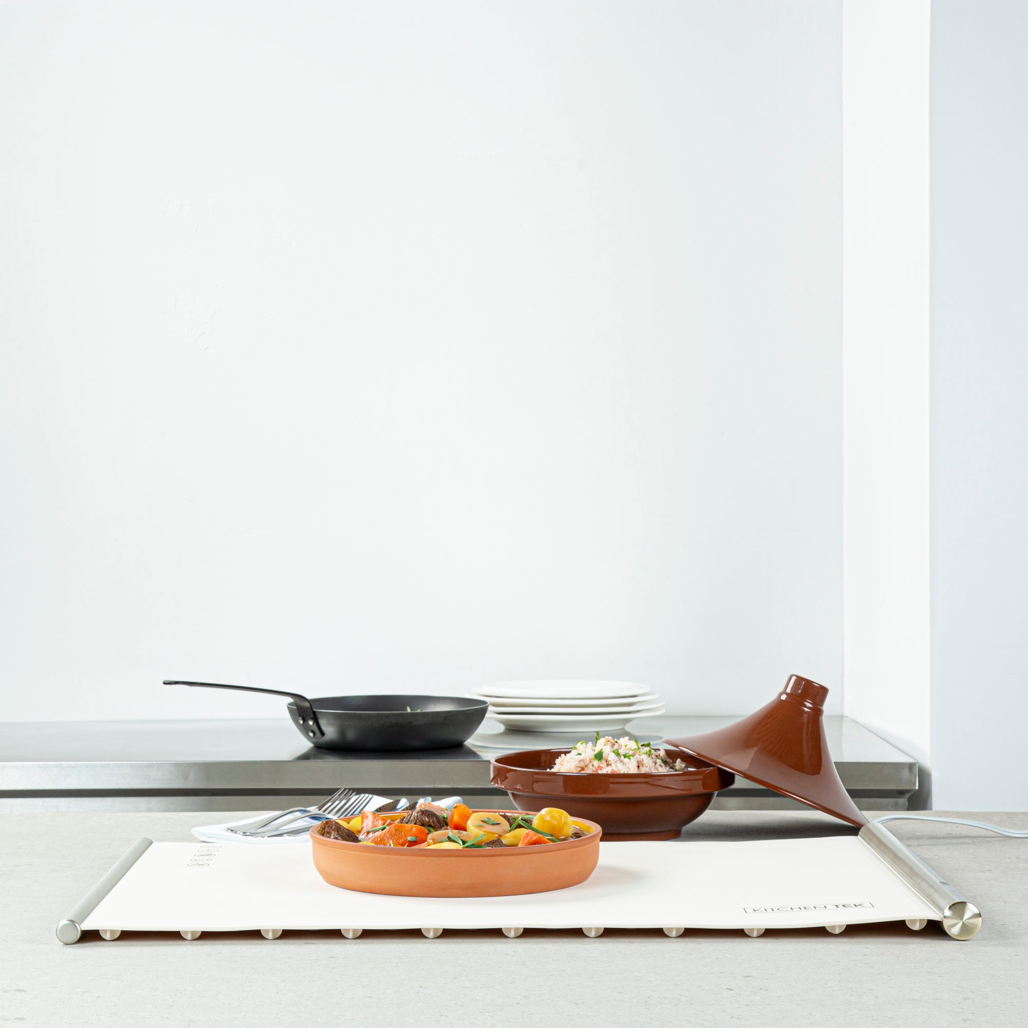 Kitchen Tek Beige Silicone Food Warmer Mat - 120V, Adjustable Temperature, Roll Up - 26 1/4" x 16 3/4" x 1" - 1 count box