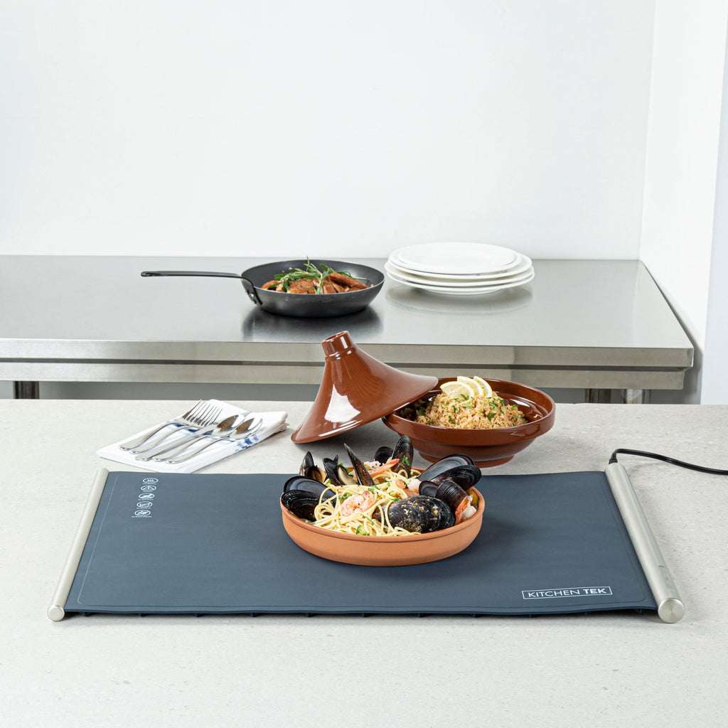 Kitchen Tek Dark Blue Silicone Food Warmer Mat - 120V, Adjustable Temperature, Roll Up - 26 1/4" x 16 3/4" x 1" - 1 count box