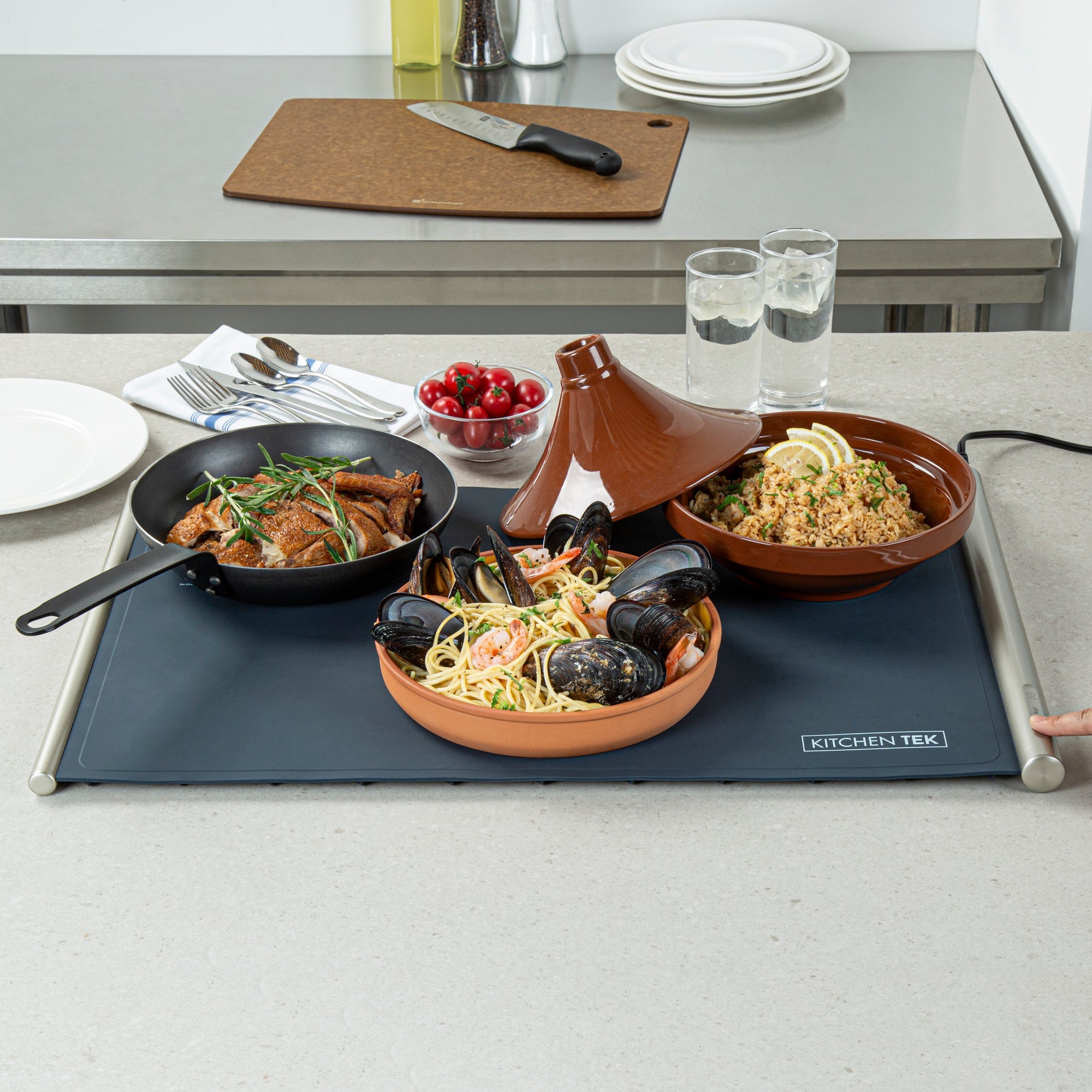 Kitchen Tek Dark Blue Silicone Food Warmer Mat - 120V, Adjustable Temperature, Roll Up - 26 1/4" x 16 3/4" x 1" - 1 count box