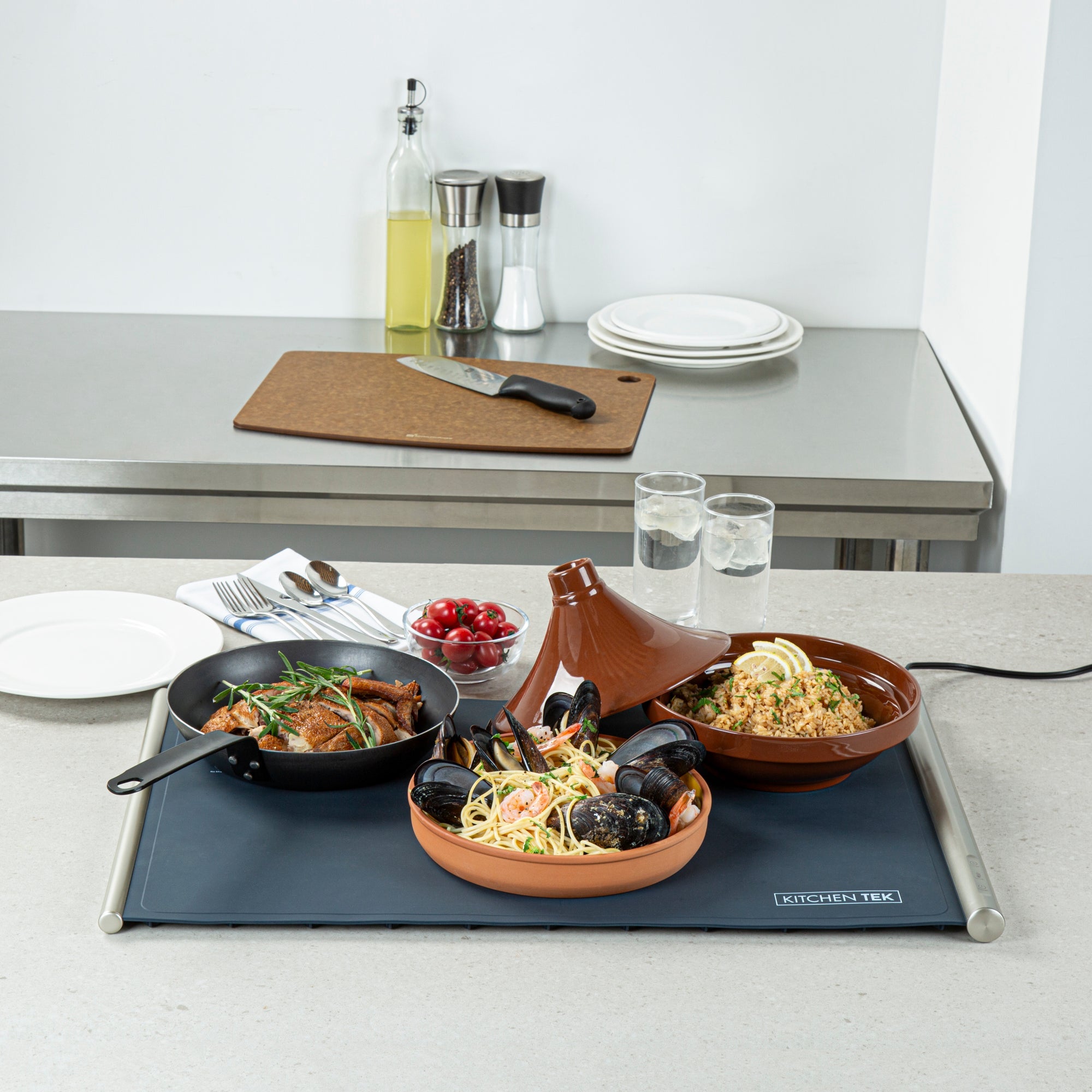 Kitchen Tek Dark Blue Silicone Food Warmer Mat - 120V, Adjustable Temperature, Roll Up - 26 1/4" x 16 3/4" x 1" - 1 count box
