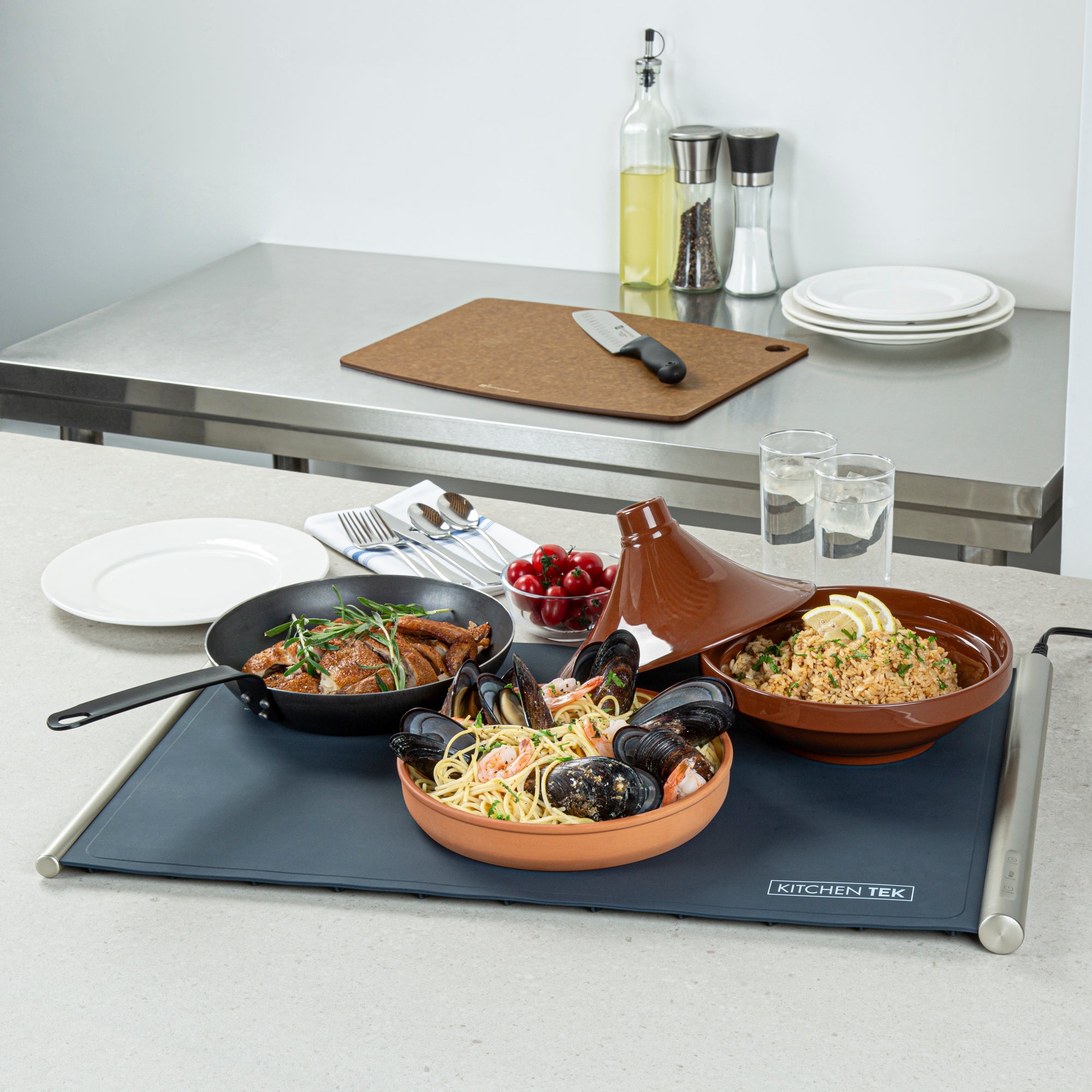 Kitchen Tek Dark Blue Silicone Food Warmer Mat - 120V, Adjustable Temperature, Roll Up - 26 1/4" x 16 3/4" x 1" - 1 count box