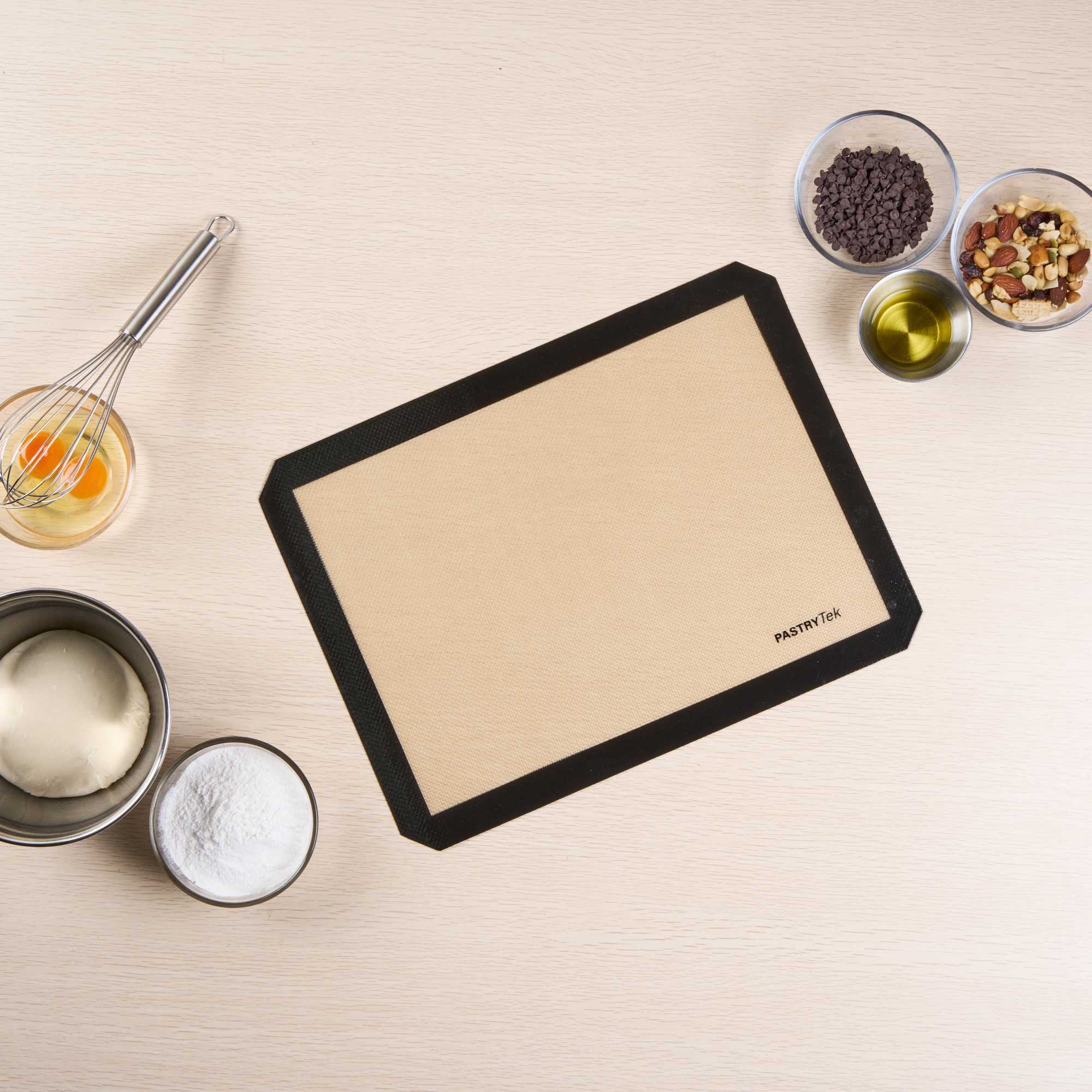 Pastry Tek Rectangle Tan and Black Silicone Half Size Baking Mat - Ultra Durable - 11 3/4" x 15 3/4" - 1 count box