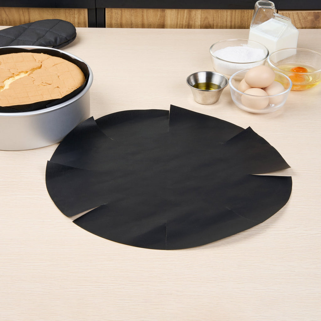 Pastry Tek Round Black Fiberglass Cake Tin Liner - Non-Stick, Foldable - 9 1/2" x 9 1/2" - 5 count box