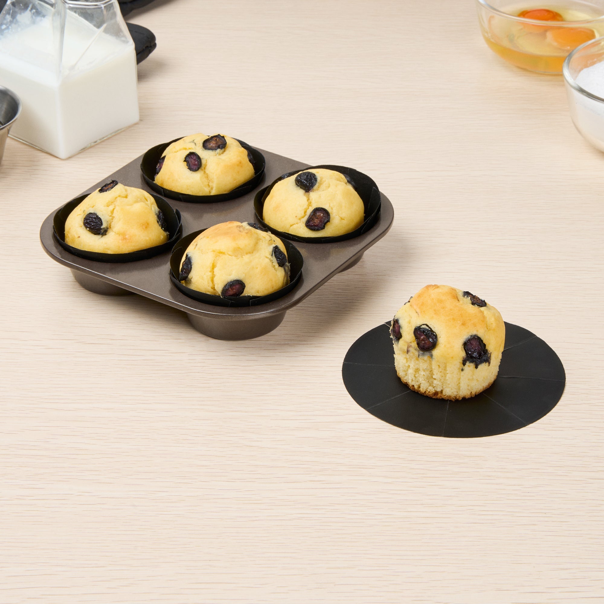 Pastry Tek Round Black Fiberglass Cupcake / Muffin Liner - Non-Stick, Foldable - 2" x 2" - 12 count box