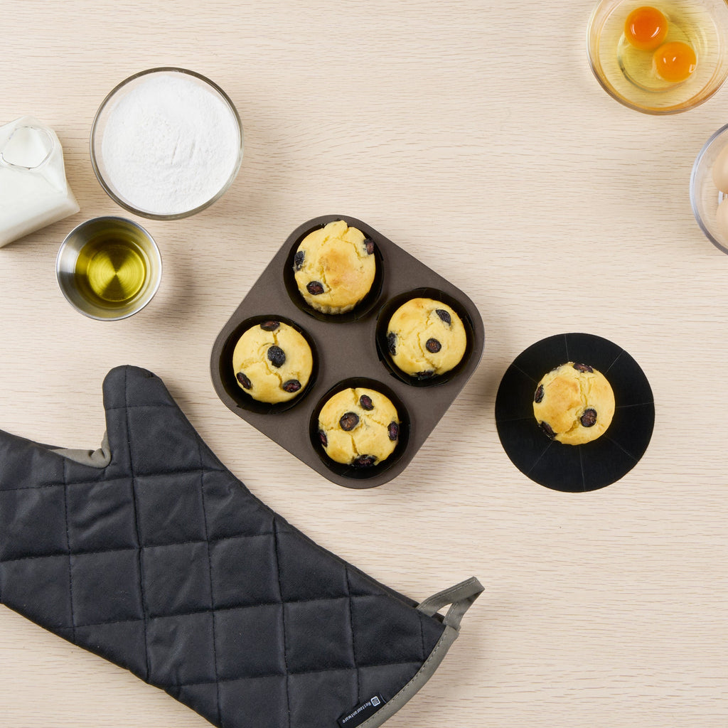 Pastry Tek Round Black Fiberglass Cupcake / Muffin Liner - Non-Stick, Foldable - 2" x 2" - 12 count box