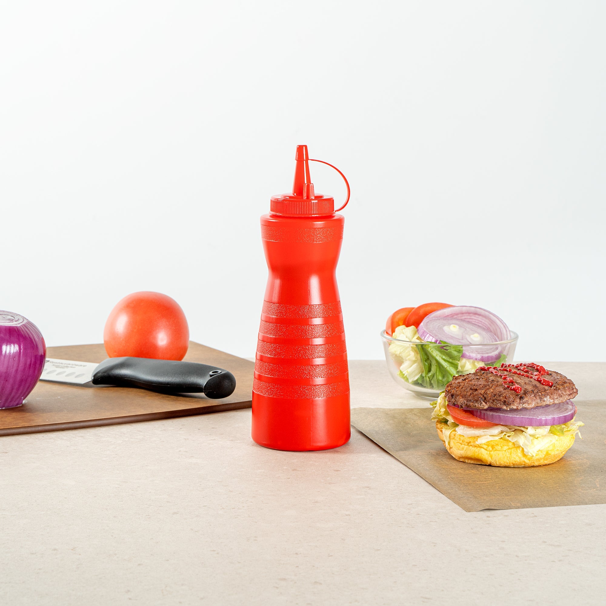 Sauce Tek 16 oz Red Plastic Squeeze Bottle - with Cap - 2 3/4" x 2 3/4" x 7 3/4" - 1 count box