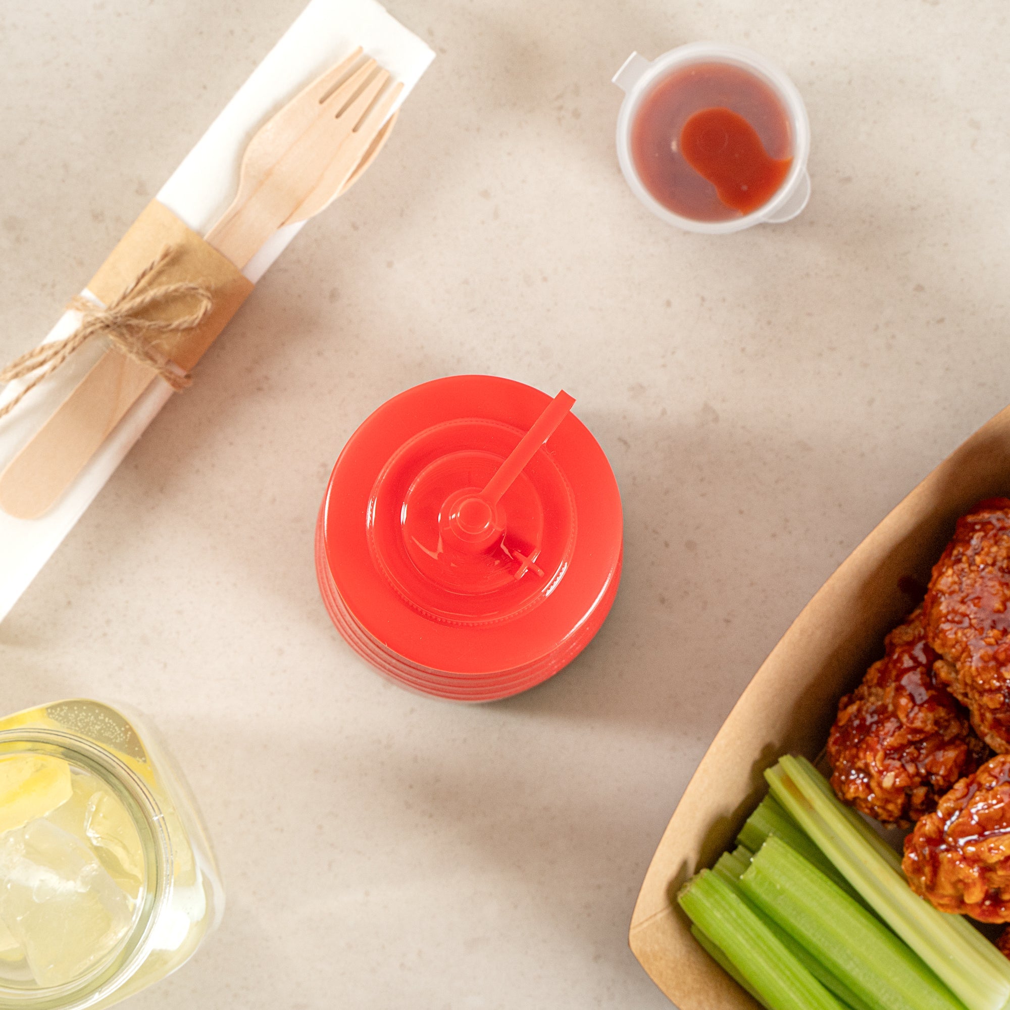 Sauce Tek 24 oz Red Plastic Squeeze Bottle - with Cap - 2 3/4" x 2 3/4" x 10 1/4" - 1 count box