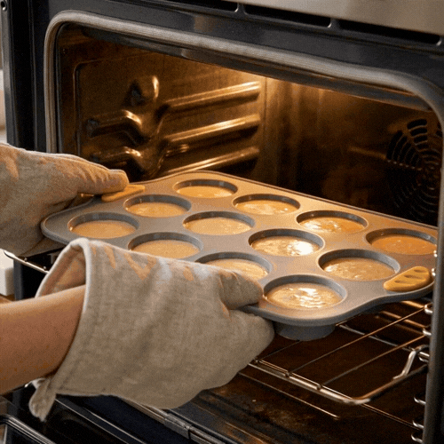 Pastry Tek Gray Silicone Muffin / Cupcake Pan - 12 Compartments, Non-Stick, with Handles - 13" x 9 1/4" x 1 1/4" - 40 count box