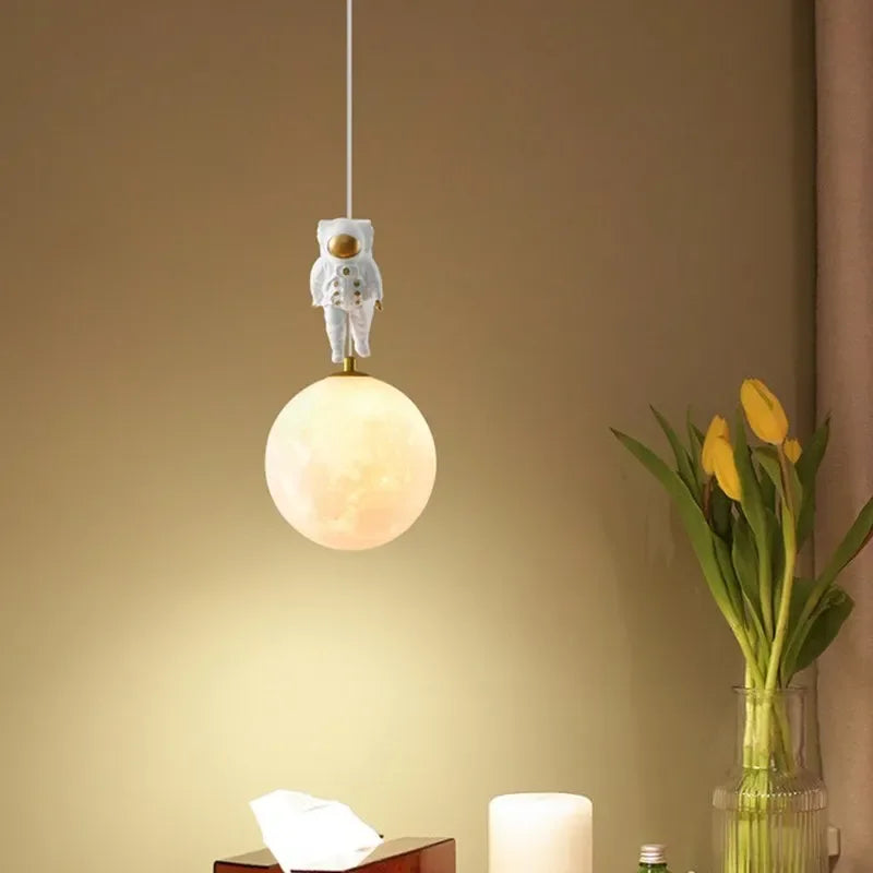 DecorBites™ Astronaut Moon LED Pendant Light for Children's Room, Nordic Iron Design.
