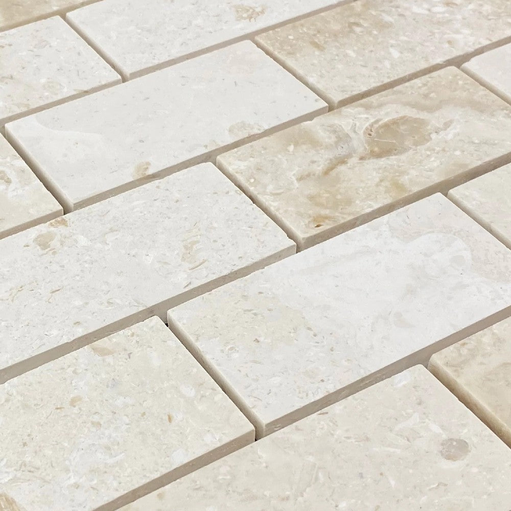 Shell Stone Limestone Brick Mosaic Tile - Honed 2x4 Mesh Backed