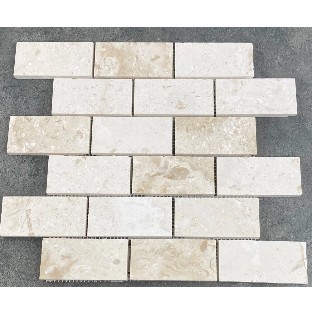 Shell Stone Limestone Brick Mosaic Tile - Honed 2x4 Mesh Backed