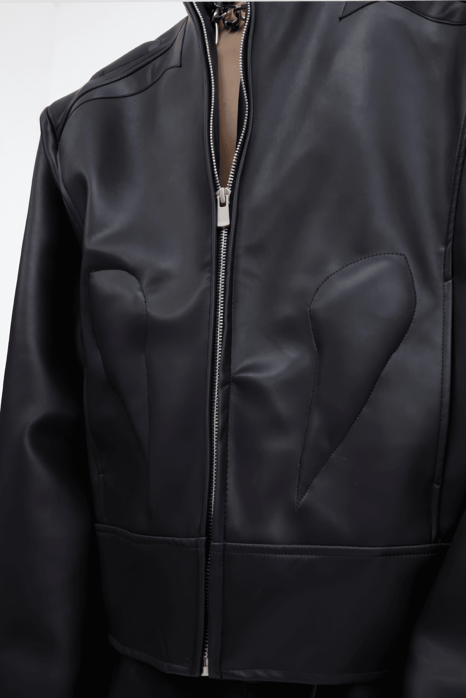 Short Leather Jacket – Modern Sculptural Design with Metal Logo