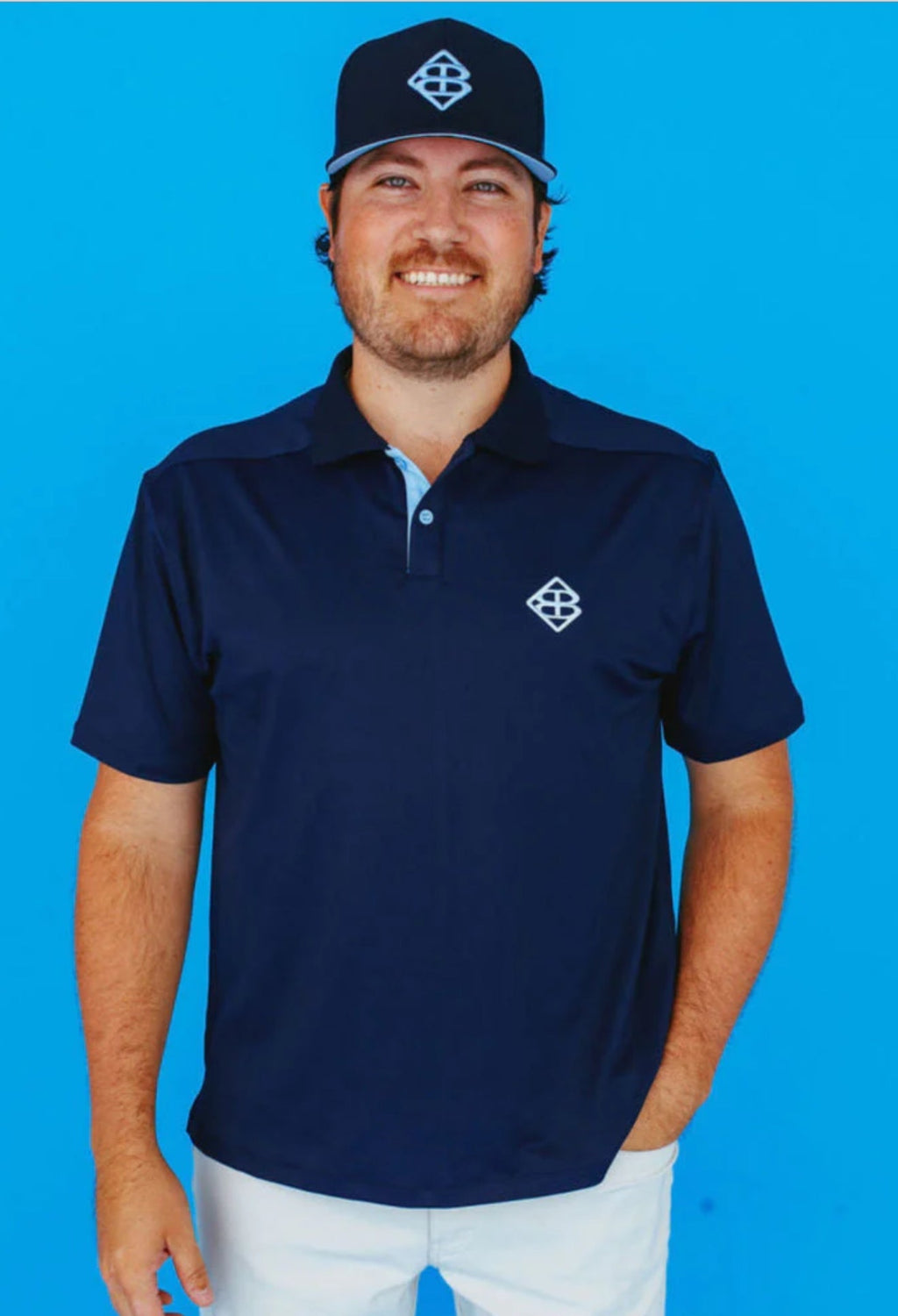 Brianna Cannon - BC Men’s Navy and Columbia Blue Golf Polo