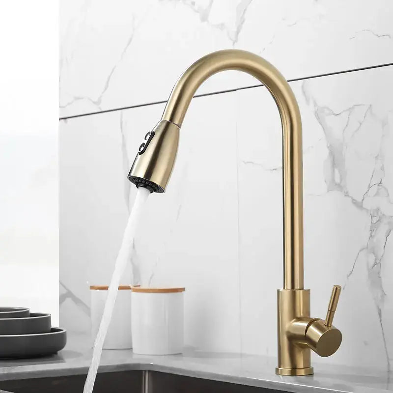 Brushed gold kitchen faucet with pull down spray head
