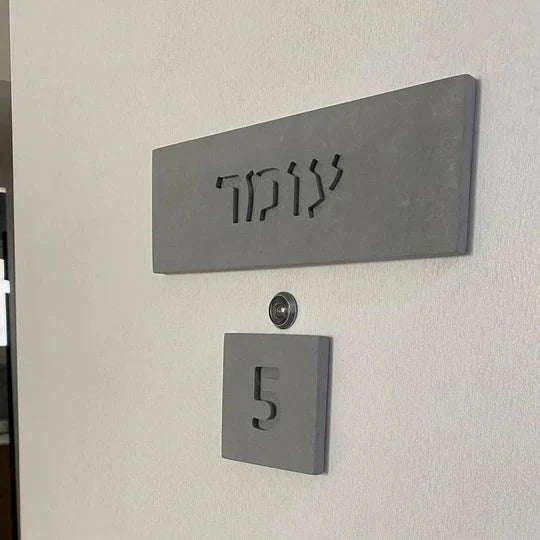 A spectacular home sign with a personalized design made of natural gray concrete with engraving - Concrete Chic series