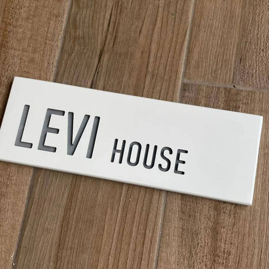 A personalized engraved house sign, handmade from clean white concrete - Snow series