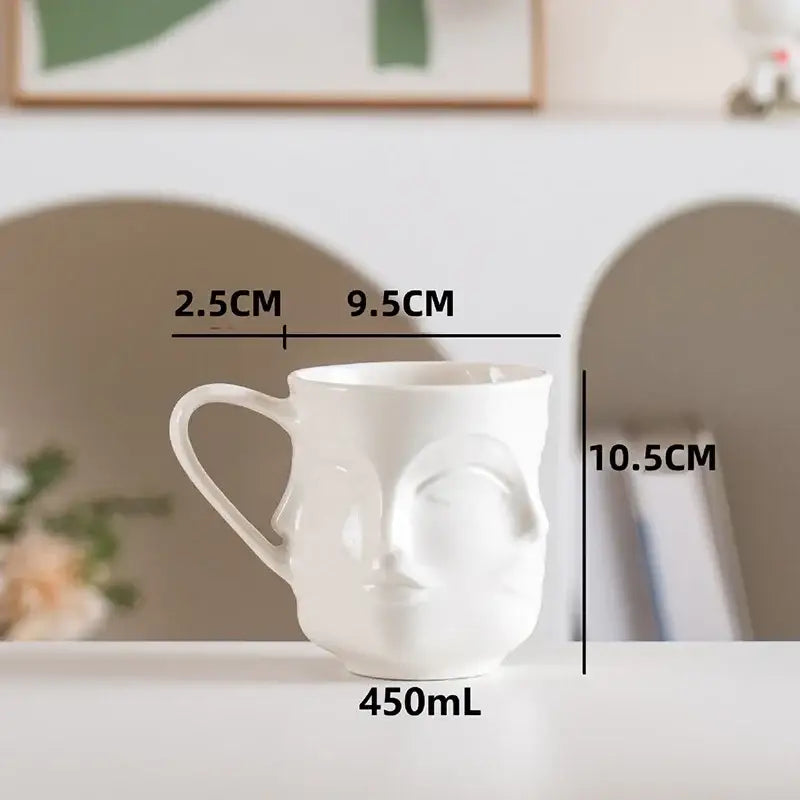 DecorBites™ Abstract Face Ceramic Coffee Mug Dining Table Teacup Juice Container
