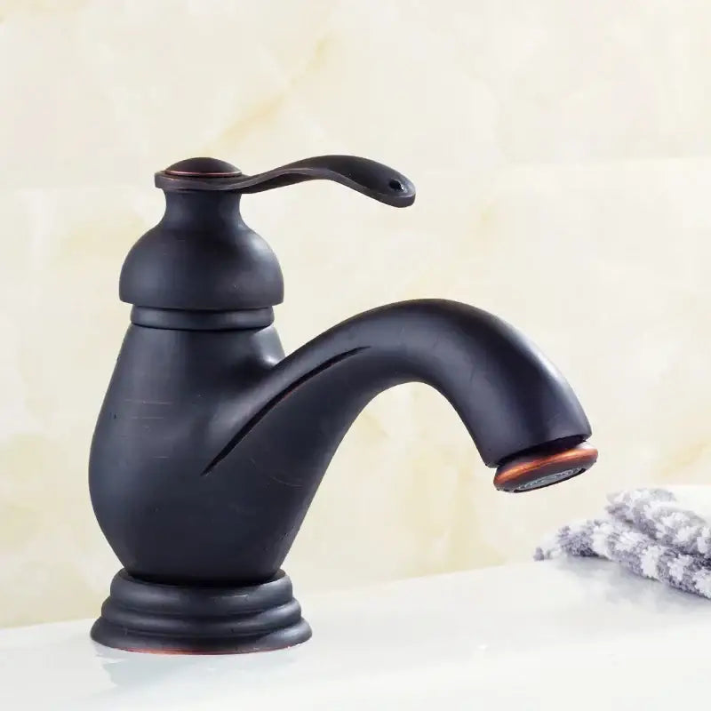 DecorBites™ Antique Brass Single Handle Deck Mount Bathroom Sink Faucet.