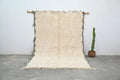 Handwoven cream and black tapis beni ouarain living room rug