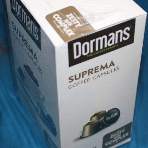 Angled side view of Dormans Suprema Coffee Capsules preserving freshness and aroma