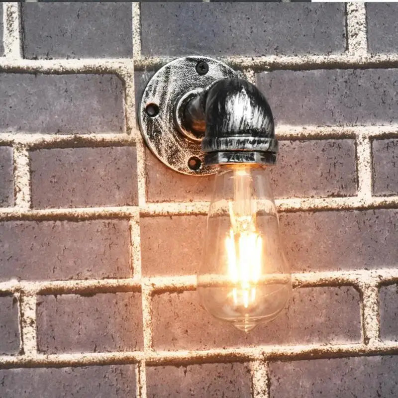 Industrial iron pipe wall sconce bedroom brass filament light