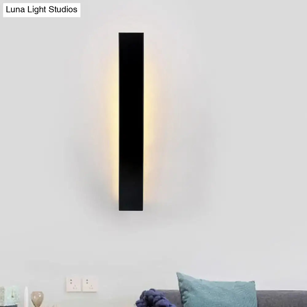 Minimalist black & white aluminum shade direct wired sconce bedroom