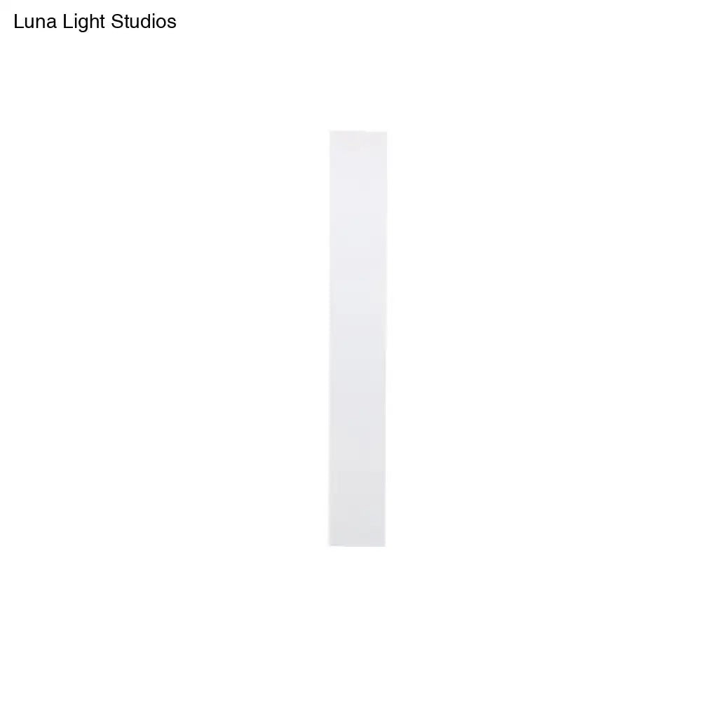 Minimalist black & white aluminum shade direct wired sconce bedroom