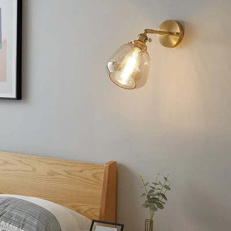 Modern amber clear glass wall sconce bedroom rotating brass lamp