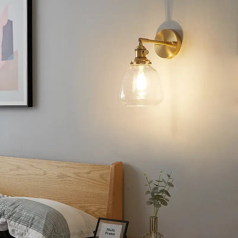 Modern amber clear glass wall sconce bedroom rotating brass lamp