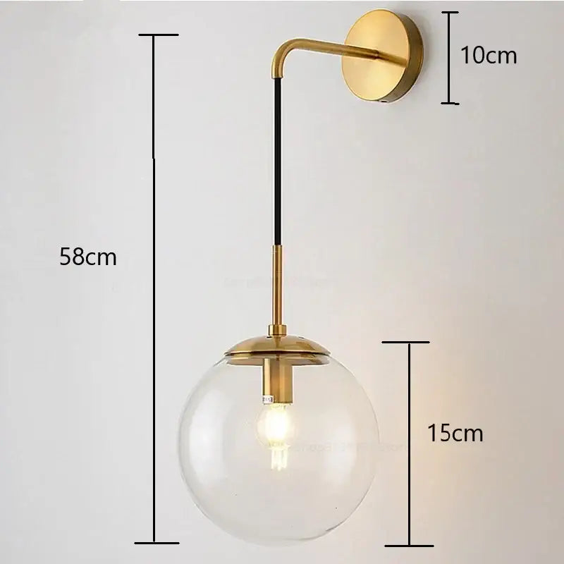 Modern brass and glass ball wall lamp for bedroom decor